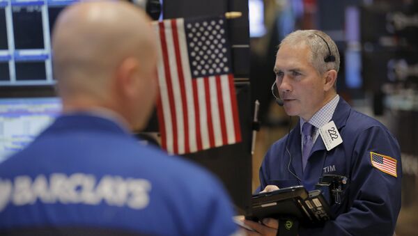 Traders work on the floor of the New York Stock Exchange shortly after the opening bell in New York , December 30, 2015 - Sputnik International