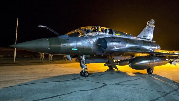 This photo released on Monday, Nov. 9, 2015 by the French Army Communications Audiovisual office (ECPAD) shows a French army Mirage 2000 jet on the tarmac of an undisclosed air base as part of France's Operation Chammal launched in September 2015 in support of the US-led coalition against Islamic State group - Sputnik International