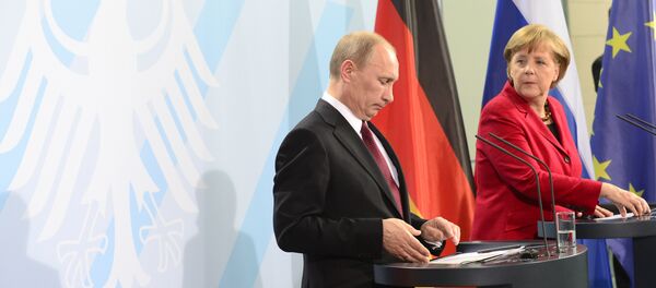 German Chancellor Angela Merkel (R) and Russian President Vladimir Putin at the Chancellery in Berlin.The main topic was the unrest in Syria, as Western powers attempt to persuade the Kremlin to drop its support for the regime of Bashir al-Assad (File) German Chancellor Angela Merkel (R) and Russian President Vladimir Putin at the Chancellery in Berlin.The main topic was the unrest in Syria, as Western powers attempt to persuade the Kremlin to drop its support for the regime of Bashir al-Assad (File) - Sputnik International