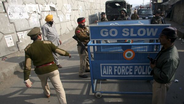 File Photo: Indian security personnel place a barricade on a road outside the Indian Air Force (IAF) base at Pathankot in Punjab, India, January 3, 2016 - Sputnik International