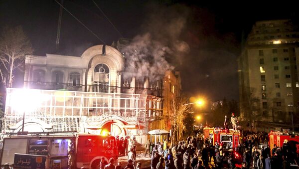 Flames rise from Saudi Arabia's embassy during a demonstration in Tehran January 2, 2016 - Sputnik International