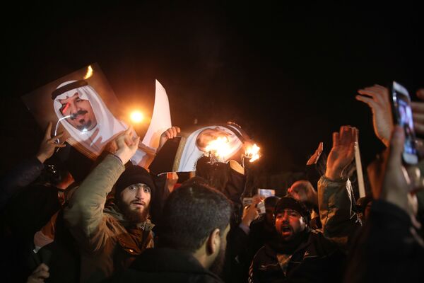 Iranian protesters gather outside the Saudi Embassy in Tehran during a demonstration against the execution of prominent Shiite Muslim cleric Nimr al-Nimr by Saudi authorities, on January 2, 2016 Iranian protesters gather outside the Saudi Embassy in Tehran during a demonstration against the execution of prominent Shiite Muslim cleric Nimr al-Nimr by Saudi authorities, on January 2, 2016 - Sputnik International
