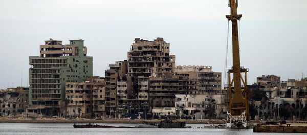 A general view shows destroyed buildings in Libya's eastern coastal city of Benghazi on October 20, 2015 - Sputnik International
