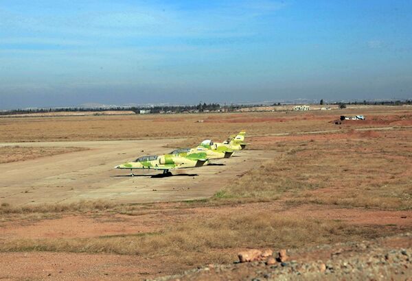 This photo released by the Syrian official news agency SANA shows warplanes inside the Kuweires air base, east of Aleppo, Syria, Wednesday, Nov. 11, 2015 This photo released by the Syrian official news agency SANA shows warplanes inside the Kuweires air base, east of Aleppo, Syria, Wednesday, Nov. 11, 2015 - Sputnik International
