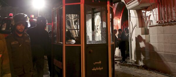 Iranian security stand guard to protect Saudi Arabia's embassy in Tehran, Iran, while a group of demonstrators gathered to protest execution of a Shiite cleric in Saudi Arabia, Sunday, Jan. 3, 2016. Iranian security stand guard to protect Saudi Arabia's embassy in Tehran, Iran, while a group of demonstrators gathered to protest execution of a Shiite cleric in Saudi Arabia, Sunday, Jan. 3, 2016. - Sputnik International