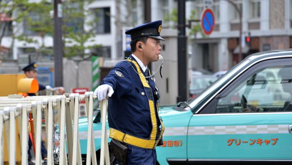 Police officer  in Tokyo - Sputnik International