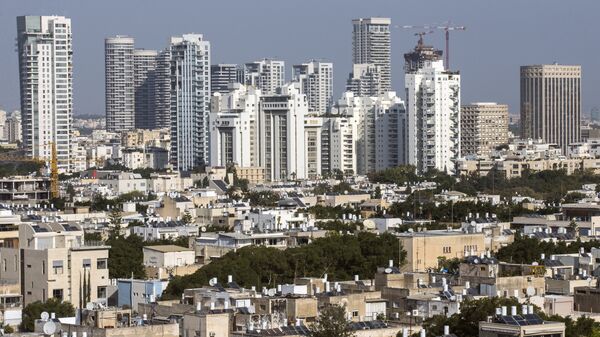 A general view taken shows buildings in the Israeli Mediterranean coastal city of Tel Aviv - Sputnik International