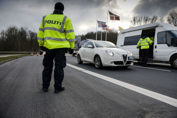 Danish Police officers check vehicles at the bordertown of Krusa, Denmark. Danish Police officers check vehicles at the bordertown of Krusa, Denmark. - Sputnik International