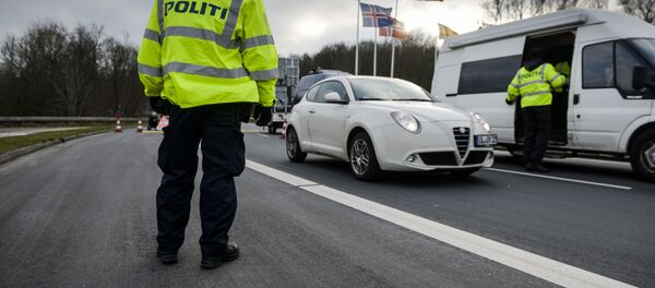 Danish Police officers check vehicles at the bordertown of Krusa, Denmark. Danish Police officers check vehicles at the bordertown of Krusa, Denmark. - Sputnik International