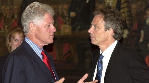 Former US President Bill Clinton speaks with then British Prime Minister Tony Blair at the Guildhall in London, before a Banquet dinner hosted by the Mayor of the City of London, 11 July, 2003. - Sputnik International