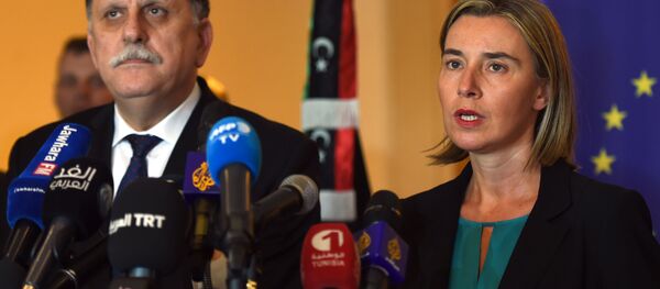 Libyan Prime Minister Fayez al-Sarraj (L) and EU foreign policy chief Federica Mogherini (R) attend a joint press conference in Tunis on January 8, 2016. Libyan Prime Minister Fayez al-Sarraj (L) and EU foreign policy chief Federica Mogherini (R) attend a joint press conference in Tunis on January 8, 2016. - Sputnik International