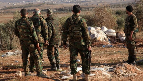 Syrian Army soldiers seen near the Deir ez-Zor airbase. File photo - Sputnik International