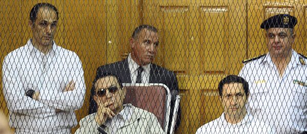 FILE - In this Sept. 14, 2013 file photo, former Egyptian President Hosni Mubarak, seated center left, and his two sons, Gamal Mubarak, left, and Alaa Mubarak attend a hearing in a courtroom in Cairo, Egypt FILE - In this Sept. 14, 2013 file photo, former Egyptian President Hosni Mubarak, seated center left, and his two sons, Gamal Mubarak, left, and Alaa Mubarak attend a hearing in a courtroom in Cairo, Egypt - Sputnik International