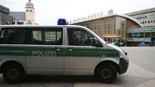 A police vehicle patrols at the main square and in front of the central railway station in Cologne, Germany, January 5, 2016 - Sputnik International