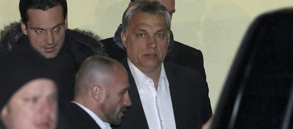 Hungarian Prime Minister Viktor Orban (C) leaves a guest house Zielona Owieczka after a meetig with Jaroslaw Kaczynski, leader of Poland's ruling Law and Justice party (PiS) in Nidzica, Poland January 6, 2016 Hungarian Prime Minister Viktor Orban (C) leaves a guest house Zielona Owieczka after a meetig with Jaroslaw Kaczynski, leader of Poland's ruling Law and Justice party (PiS) in Nidzica, Poland January 6, 2016 - Sputnik International
