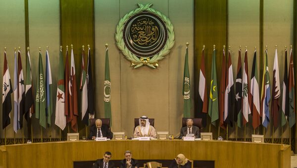 Emirati Foreign Minister Sheikh Abdullah bin Zayed al-Nahyan (C), Arab League chief Nabil al-Arabi (L), and Arab League deputy Ahmed bin Helli (R) attend an emergency meeting of Arab foreign ministers in the Egyptian capital Cairo on January 10, 2016 - Sputnik International
