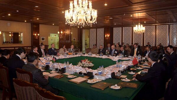 In this photo released by Associated Press of Pakistan, delegates from Pakistan, Afghanistan, China and United States attend a meeting hoping to lay the roadmap for peace talks with the Taliban, at the foreign ministry in Islamabad, Pakistan, Monday, Jan. 11, 2016 - Sputnik International