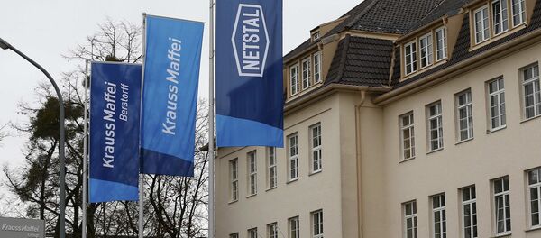 Flags flutter in front of a KraussMaffei company building in Munich, Germany, January 11, 2016 - Sputnik International