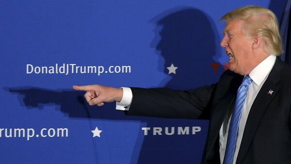 US Republican presidential candidate Donald Trump takes the stage at a campaign rally in Windham, New Hampshire, January 11, 2016. - Sputnik International