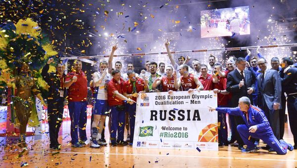 Coaches and athletes of the Russian national men's voleyball team after a victory in a final match of the men's qualification volleyball tournament for the 2016 Olympic Games between France and Russia - Sputnik International