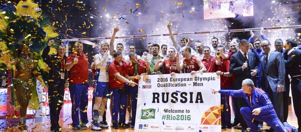 Coaches and athletes of the Russian national men's voleyball team after a victory in a final match of the men's qualification volleyball tournament for the 2016 Olympic Games between France and Russia Coaches and athletes of the Russian national men's voleyball team after a victory in a final match of the men's qualification volleyball tournament for the 2016 Olympic Games between France and Russia - Sputnik International