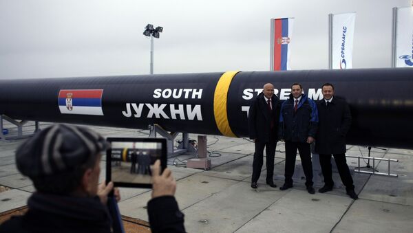 People have their photo taken next to the first section of the Gazprom South Stream natural gas pipeline in the town of Sajkas, 80 kilometers (50 miles) north of Belgrade, Serbia . file photo - Sputnik International
