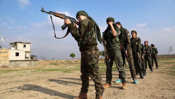 We have proved that women can hold their own in the fight against Daesh, according to Servin Rojava, commander of an all-female branch of the Kurdish People's Protection Units - Sputnik International