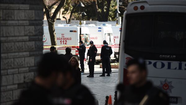 Turkish police stand next to ambulances as they block access to the Blue Mosque area on January 12, 2016 after a blast in Istanbul's tourist hub of Sultanahmet left 10 people dead - Sputnik International