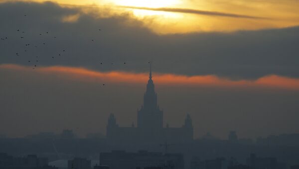 The sun sets over the Moscow State University on a frosty winter day in Moscow, Russia - Sputnik International