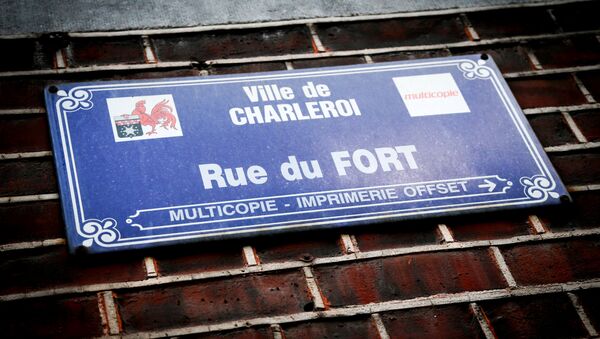 A street name sign is pictured on a wall at the Rue du Fort street in Charleroi, Belgium on January 13, 2016. - Sputnik International