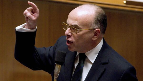 Bernard Cazeneuve replies to deputies during the questions to the government session at the National Assembly in Paris, France, January 12, 2016 - Sputnik International
