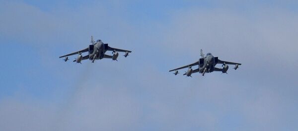 Two British Tornados warplanes fly over the RAF Akrotiri, a British air base near costal city of Limassol, Cyprus as they arrive from an airstrike against Islamic State group targets in Syria. (File) Two British Tornados warplanes fly over the RAF Akrotiri, a British air base near costal city of Limassol, Cyprus as they arrive from an airstrike against Islamic State group targets in Syria. (File) - Sputnik International