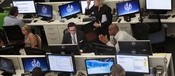 Al-Jazeera America editorial newsroom staff prepare for their first broadcast in New York. Al-Jazeera America editorial newsroom staff prepare for their first broadcast in New York. - Sputnik International