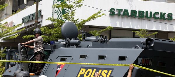 A police armoured personnel carrier is seen parked near the scene of an attack in central Jakarta January 14, 2016. A police armoured personnel carrier is seen parked near the scene of an attack in central Jakarta January 14, 2016. - Sputnik International