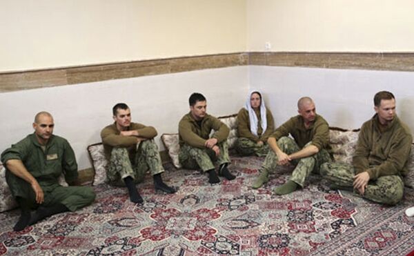 This picture released by the Iranian Revolutionary Guards on Wednesday, Jan. 13, 2016, shows detained American Navy sailors in an undisclosed location in Iran. Less than a day after 10 U.S. Navy sailors were detained in Iran when their boats drifted into Iranian waters, they and their vessels were back safely Wednesday with the American fleet This picture released by the Iranian Revolutionary Guards on Wednesday, Jan. 13, 2016, shows detained American Navy sailors in an undisclosed location in Iran. Less than a day after 10 U.S. Navy sailors were detained in Iran when their boats drifted into Iranian waters, they and their vessels were back safely Wednesday with the American fleet - Sputnik International