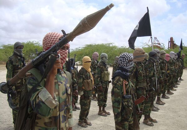 Al-Shabaab fighters display weapons as they conduct military exercises in northern Mogadishu, Somalia Al-Shabaab fighters display weapons as they conduct military exercises in northern Mogadishu, Somalia - Sputnik International