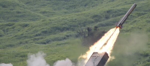 Ground Self-Defense Force anti-land mine missile is launched during an annual live firing exercise - Sputnik International