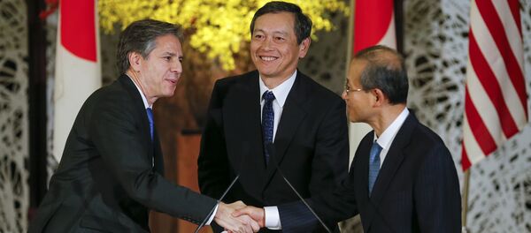 US Deputy Secretary of State Antony Blinken, left, Japanese Vice Foreign Minister Akitaka Saiki, center, and South Korean First Vice Foreign Minister Lim Sung-nam attend a joint news conference at Foreign Ministry's Iikura Guesthouse in Tokyo Saturday, Jan. 16, 2016 following their trilateral meeting. - Sputnik International