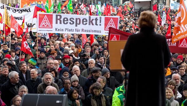 People gather at the center of Stuttgart, Germany during a rally to support refugees Saturday Jan. 16, 2016. Poster reads: Respect, No place for Racism. - Sputnik International