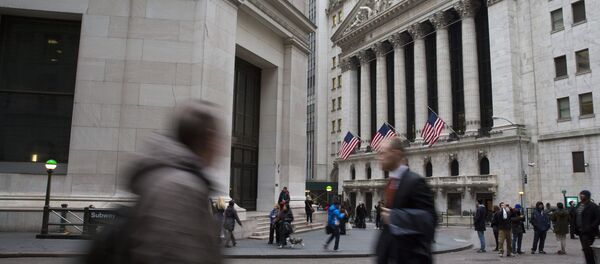 Pedestrians walk past the New York Stock Exchange, Friday, Jan. 15, 2016 - Sputnik International