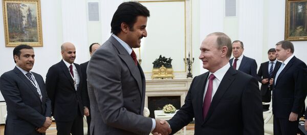 Vladimir Putin during a meeting with Qatari Emir Tamim bin Hamad al-Thani - Sputnik International