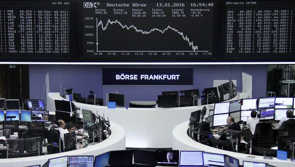 Traders work at their desks in front of the German share price index, DAX board, at the stock exchange in Frankfurt, Germany, January 13, 2016 - Sputnik International
