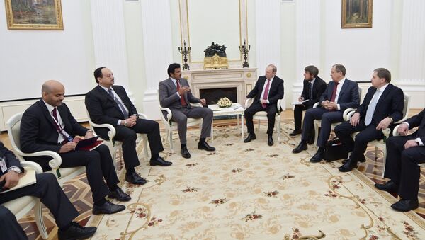 President Vladimir Putin meets with Qatar Emir Tamim bin Hamad Al-Thani - Sputnik International