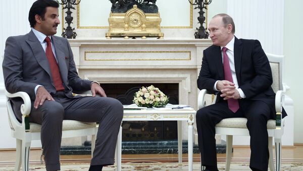 President Vladimir Putin meets with Qatar Emir Tamim bin Hamad Al-Thani - Sputnik International