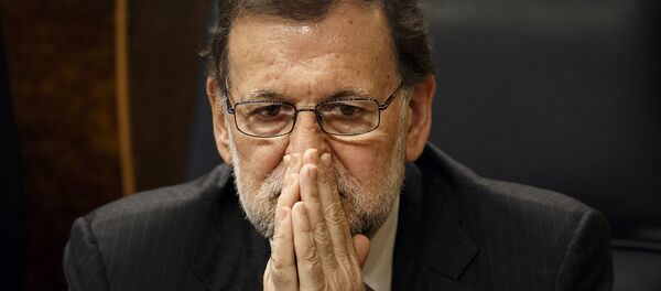 Spain's Acting Prime Minister Mariano Rajoy sits on his chair at the Spanish Parliament in Madrid, Wednesday, Jan. 13, 2016 - Sputnik International