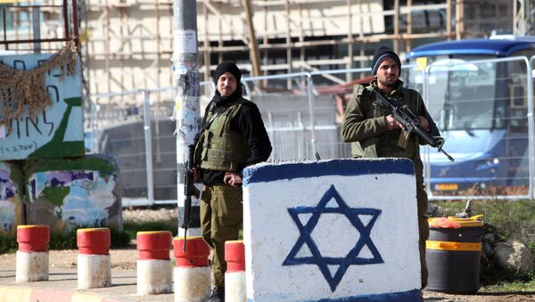 Israeli soldiers stand guard at the Gush Etzion junction in the West Bank (File) - Sputnik International