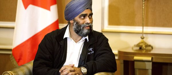 Harjit Sajjan, Canadian Defense Minister, is welcomed by Karim Sinjari, Interior Minister of the Kurdish Regional Government (KRG), not pictured, upon his arrival to Irbil, northern Iraq, Sunday, Dec. 20, 2015 Harjit Sajjan, Canadian Defense Minister, is welcomed by Karim Sinjari, Interior Minister of the Kurdish Regional Government (KRG), not pictured, upon his arrival to Irbil, northern Iraq, Sunday, Dec. 20, 2015 - Sputnik International