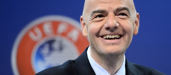 UEFA General Secretary Gianni Infantino looks on during the draw for the UEFA Champions league round of sixteen at the UEFA headquarters in Nyon on December 14, 2015 UEFA General Secretary Gianni Infantino looks on during the draw for the UEFA Champions league round of sixteen at the UEFA headquarters in Nyon on December 14, 2015 - Sputnik International