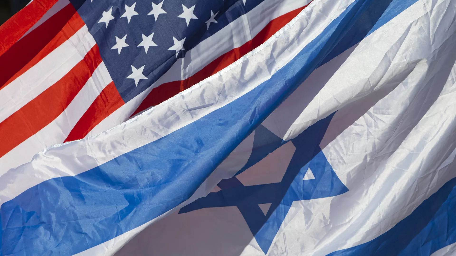 Amerykańskie i izraelskie flagi powiewają podczas przybycia sekretarza stanu USA Johna Kerry'ego do Tel Awiwu, Izrael, wtorek, 24 listopada 2015 r. - Sputnik International, 1920, 11.11.2023