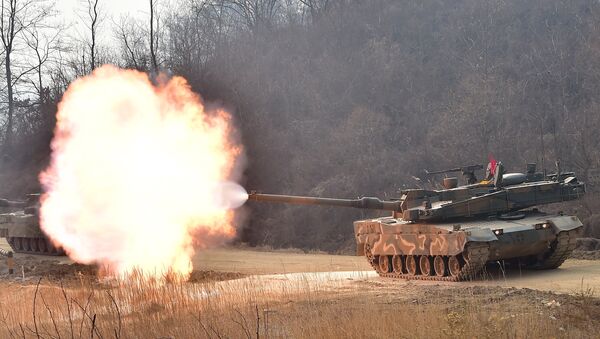 South Korean army's K-2 tank fires during a live-fire drill in Yangpyeong, 60 km east of Seoul, on February 11, 2015 - Sputnik International